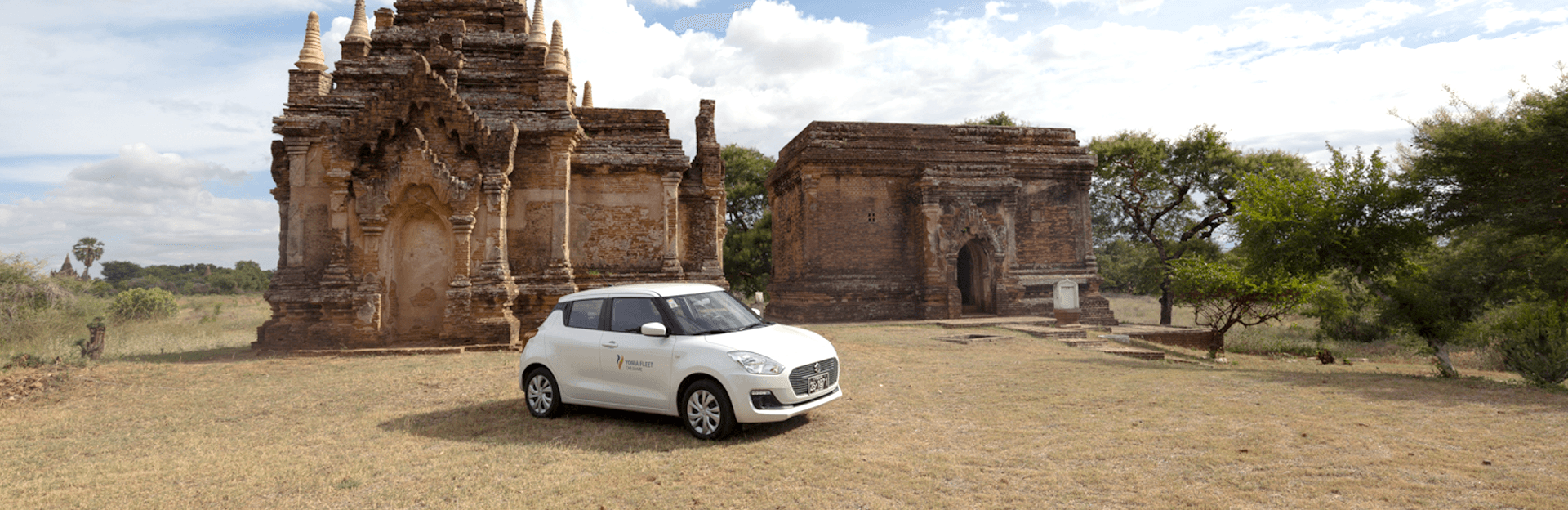 Starter Pack Business man hand on apple watch and steering wheel of a car that is blinded by bright sunlight in the windshield